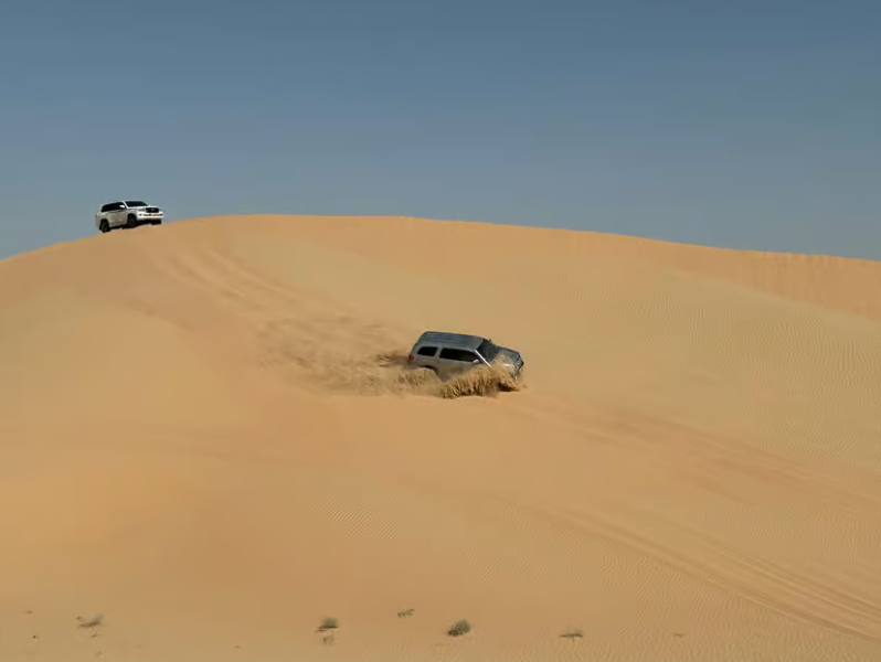 Abu Dhabi: Morning Desert Tour Camel Ride & Sandboarding | ®ExcursionMania