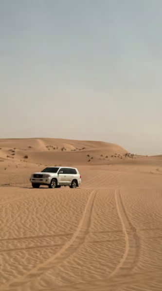Abu Dhabi: Morning Desert Tour Camel Ride & Sandboarding | ®ExcursionMania